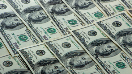 Background with money american hundred dollar bills close up