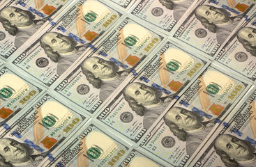 Background with money american hundred dollar bills close up