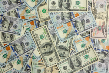 Background with money american hundred dollar bills close up