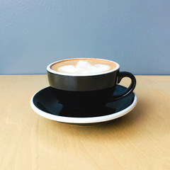 Black cappuccino cup on wodden table. No people - 250915417