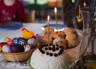 home festive Easter food, eggs, candles, pastries