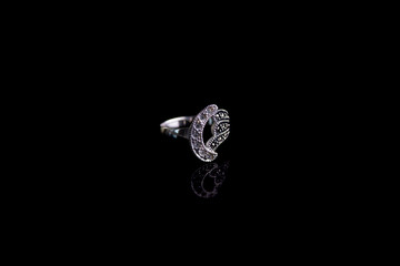 diamond ring with diamonds on black background