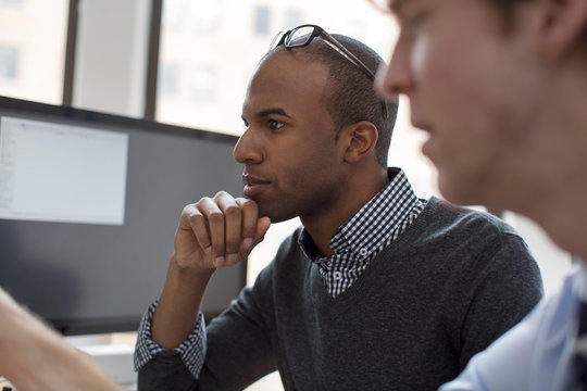 Two businessmen working in office 