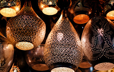 Traditional islamic lantern on a store of an old arabian market.