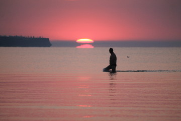 silhouette of a man at dawn