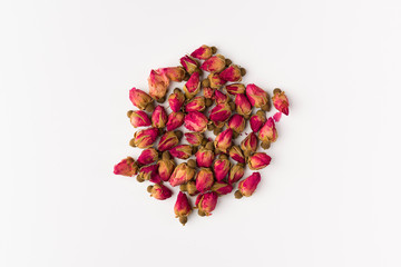 tea rose buds  isolated on white background, top view