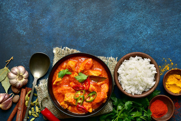 Chicken tikka masala - traditional dish of indian cuisine.Top view with copy space. - obrazy, fototapety, plakaty