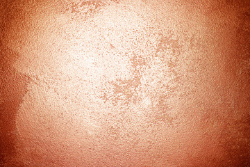 Fototapeta premium old textured wall with decorative plaster. stylized bronze, copper, metal.