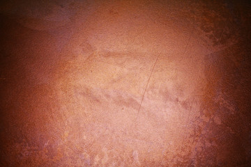 Fototapeta premium old textured wall with decorative plaster. stylized bronze, copper, metal.