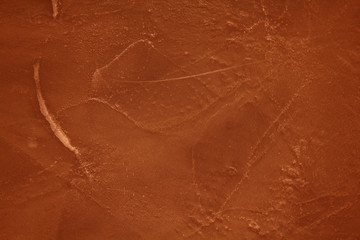 old textured wall with decorative plaster. stylized bronze, copper, metal.