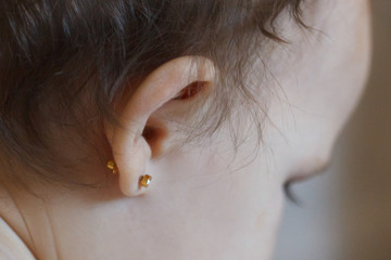 ear piercing for small children, one year old child