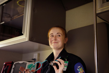 Portrait of paramedic holding stethoscope 