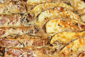 jacket potatoes with cheese. With spices, baked in the oven.
