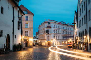 Naklejka na ściany i meble Tallinn, Estonia. Evening View Of Old Restaurant, Intersection Of Vene And Viru Streets In Night Illuminations