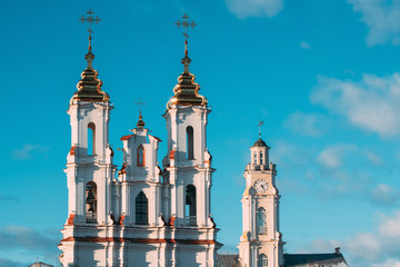 Vitebsk, Belarus. Close Up Towers Of Church Of The Resurrection And Old Town Hall In Sunny Day