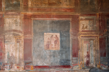 Pompeii, Italy. Ancient Frescoes In Wall Of Old Building