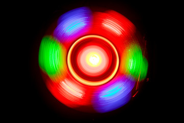 Concept of speed - Trail of fire and smoke - Vinyl record. Burning vinyl disk. Turntable vinyl record player. Retro audio equipment for disc jockey. Sound technology