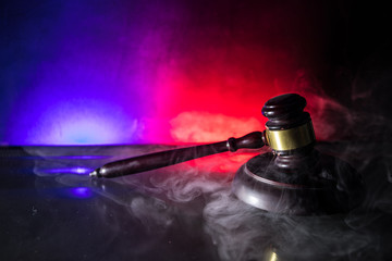 Document with judge on wooden table. Law theme. Selective focus