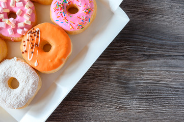 Donuts on a wooden table