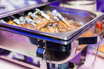 Lamb chops in metal bowl