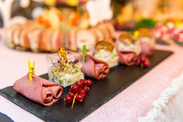 appetizers with ham, salami and salad