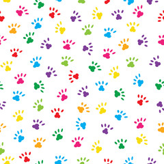 Cute cats paws in rainbow colours . Seamless pattern background.