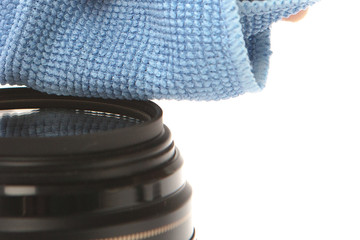 Modern camera Lens cleaning with brush close up view