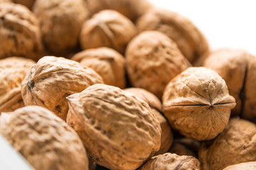 Whole walnuts background. Bunch of walnuts.