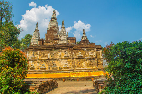 Wat Chet Yot (Wat Jed Yod) or Wat Photharam Maha Vihara, the public Buddhist temple with crowning the flat roof of the rectangular windowless building are seven spires. Located in Chiang Mai, Thailand