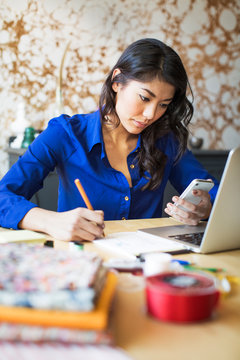 Businesswoman working in home office 