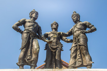 Fototapeta na wymiar Three Kings Monument, the statues of King Mengrai, the founder of Chiang Mai and his two friends, King Ramkamhaeng of Sukothai and King Ngam Muang of Payao. The sculpture is a symbol of Chiang Mai.