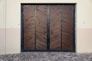 wooden big gate to the building