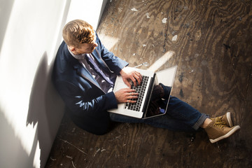 Young man using laptop 