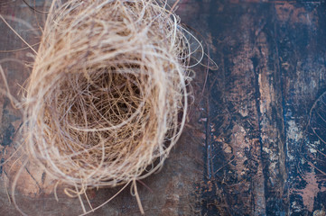 Nest on brown texture art element background.