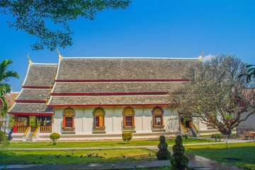 Beautiful golden buddhist church in Lanna-style ordination hall enshrines at Wat Chiang Man or Wat Chiang Mun, the oldest temple in Chiang Mai, Thailand, built in 1296 by King Mengrai in Lanna-style.