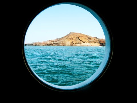 Fototapeta View of Galapagos Islands seen through porthole
