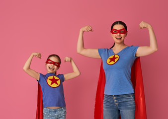 Family in Superhero costumes