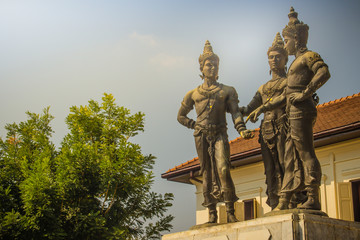 Fototapeta na wymiar Three Kings Monument, the statues of King Mengrai, the founder of Chiang Mai and his two friends, King Ramkamhaeng of Sukothai and King Ngam Muang of Payao. The sculpture is a symbol of Chiang Mai.