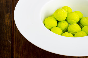 Candies gum balls in shape of tennis balls