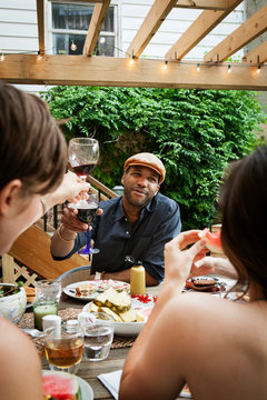 Friends toasting with red wine 