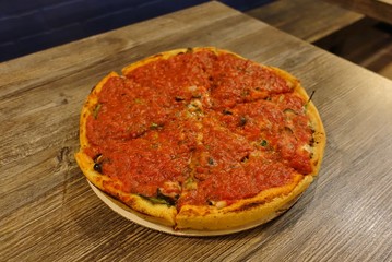 A whole vegan Chicago deep dish pizza pie