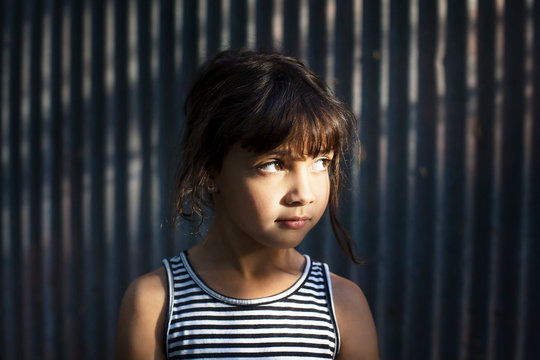 Close up of girl standing outdoors