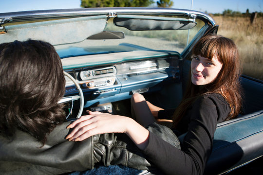 Young couple in convertible 
