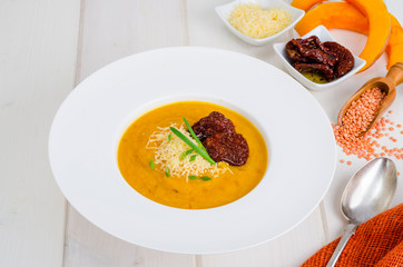 Vegetable soup cream with orange lentils.