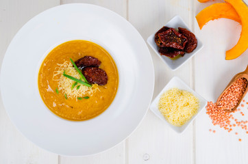 Vegetable soup cream with orange lentils.