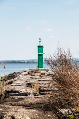 green lighthouse on Onondaga Lake in Syracuse New York