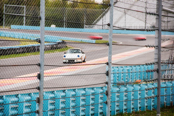 speeding car at the Watkins Glen racetrack in Watkins Glen New York