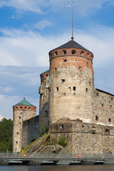 Fototapeta na wymiar Kijlin tower close-up on a sunny July day. Fortress of the city of Savonlinna, Finland