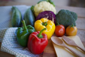 Fototapeta na wymiar fresh vegetables on wooden table