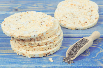 Crunchy rice or corn waffles with chia seeds and spices, healthy dietary breakfast concept
